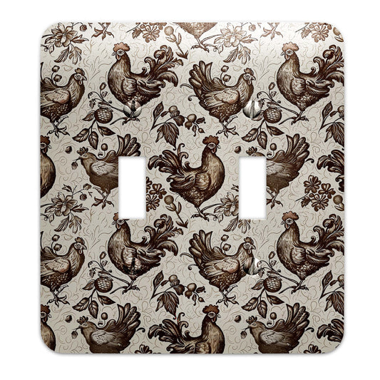a light switch cover with roosters on it