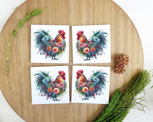 four coasters with a rooster and flowers on them